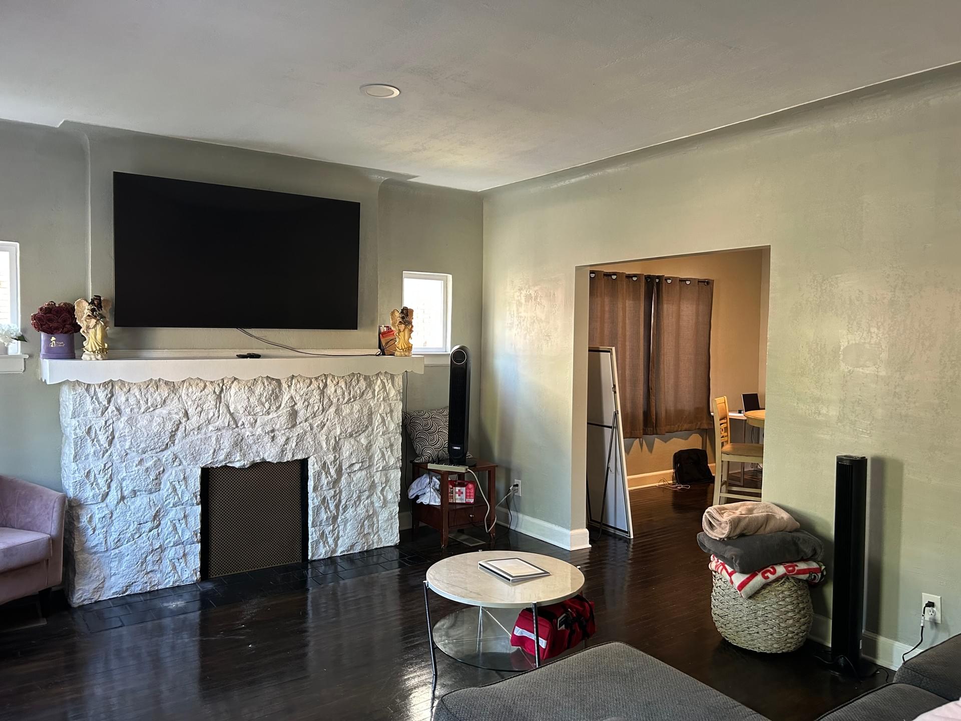Living room with stone fireplace
